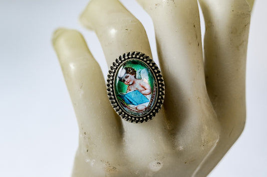 Reading Cherub Cabochon Ring